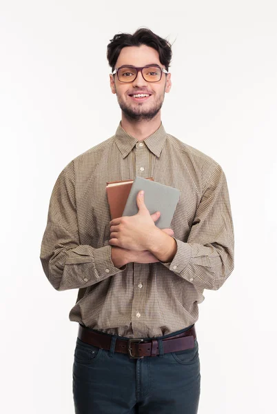 Lachende casual man met boeken — Stockfoto