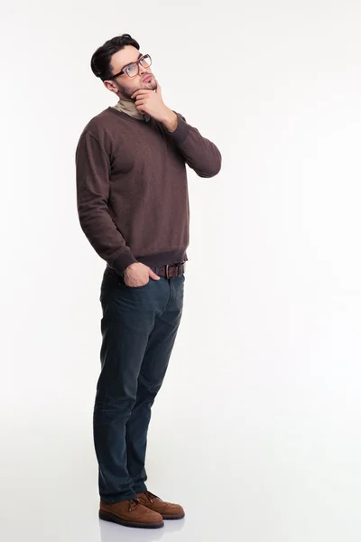 Full length portrait of a pensive man — Stock Photo, Image