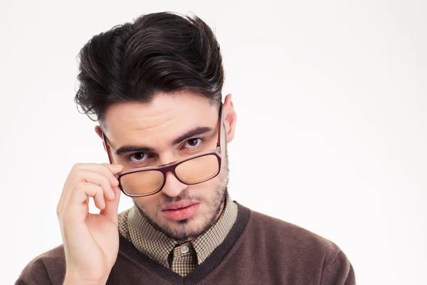 Serious man in glasses looking at camera — Stock Photo, Image