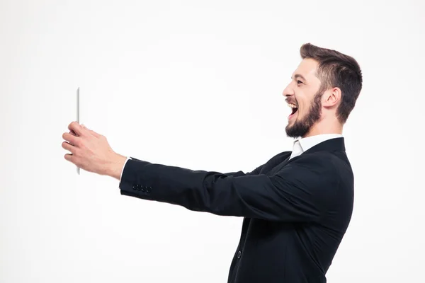 Businessman doing video call on tablet compute — Stock Photo, Image