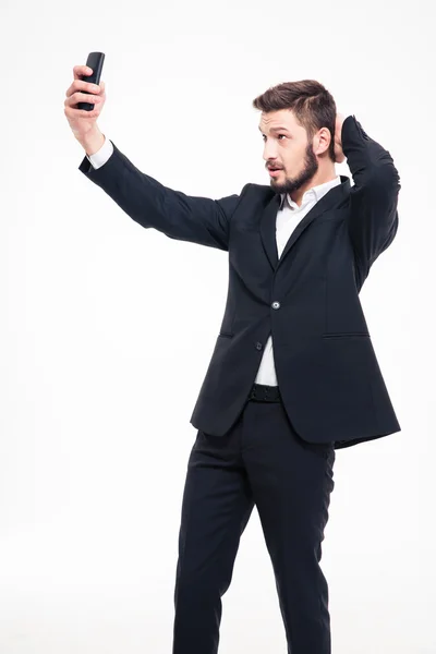 Businessman doing selfie photo on smartphone — Stock Photo, Image