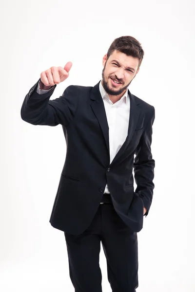 Smiling playful bearded businessman standing and pointing on you — Stok fotoğraf