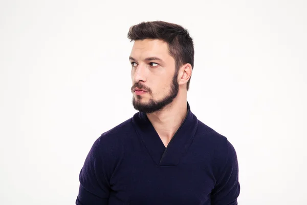 Potrait of attractive thoughtful young man with beard in sweetshirt — Stockfoto