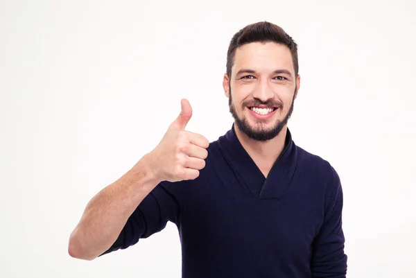 Cheerful attractive bearded man smiling and showing thumbs up — Stockfoto