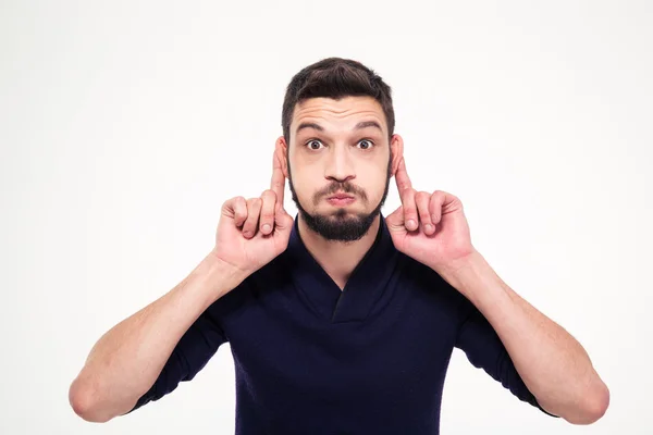 Amusing comic young bearded man making funny face — ストック写真