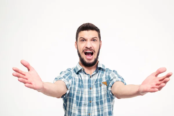 Funny concentrated young man with beard singing loudly — Stockfoto