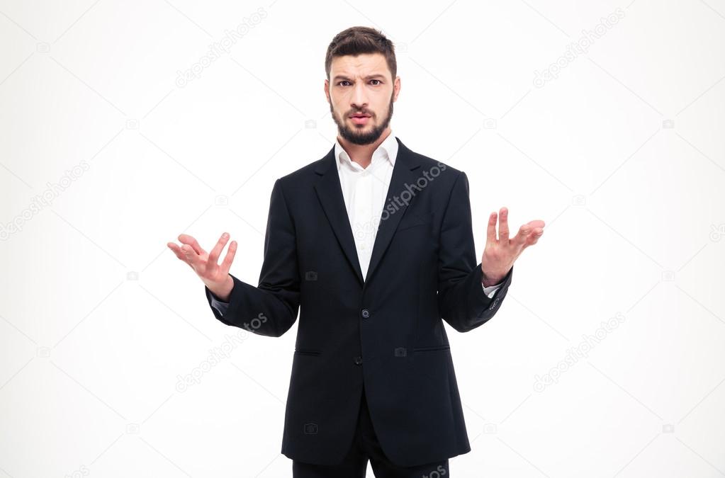Handsome puzzled businessman with beard holding copyspace in both hands
