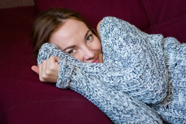 Closeup portrait of cute charming woman in grey knitted sweater — Stock Photo, Image