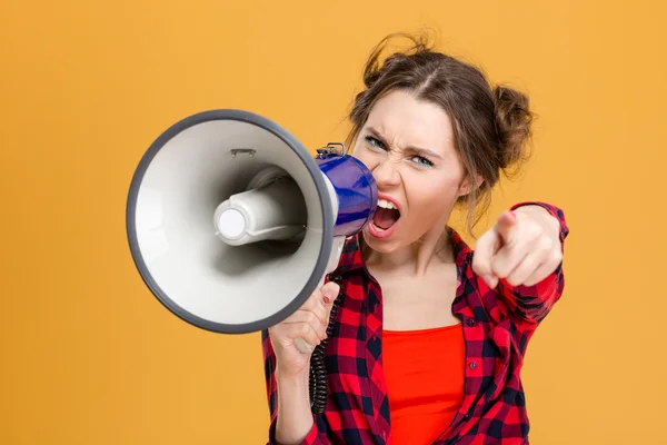 Annoyed furious woman shouting in loudspeaker and pointing on you — Stock Photo, Image