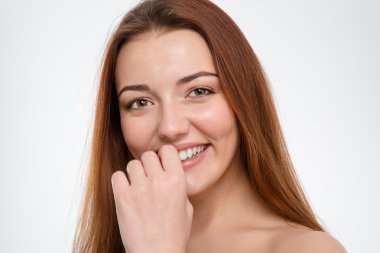 Closeup portrait of cute lovely young woman with long hair 