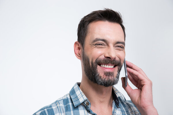 Happy man talking on the phone
