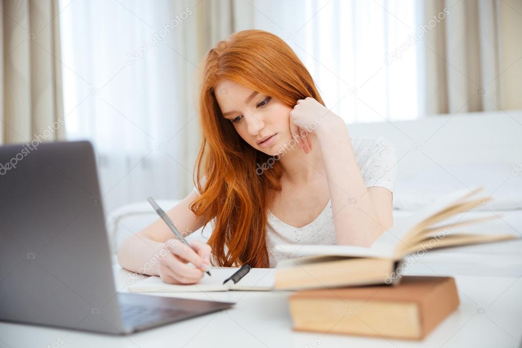 Woman doing homework at home