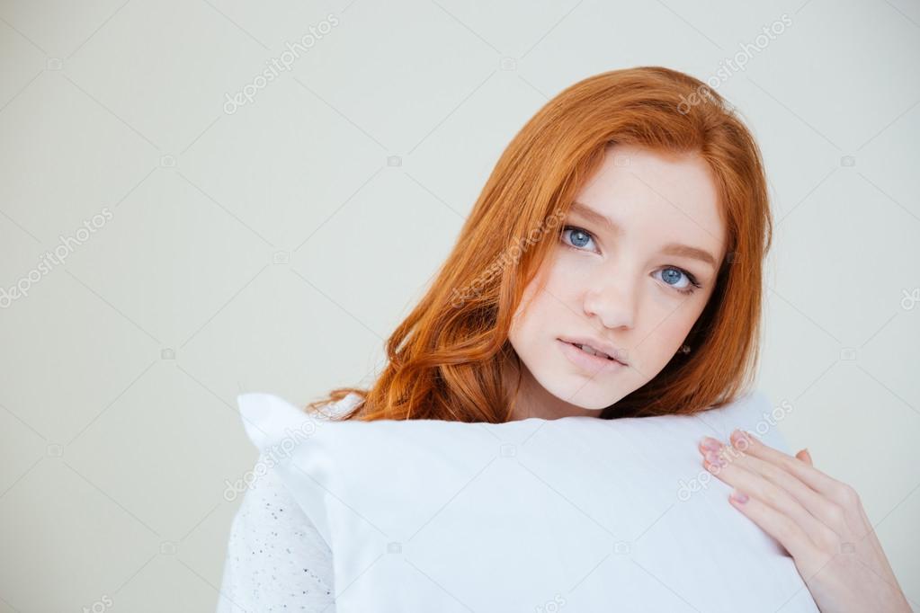 Beautiful redhead woman looking at camera