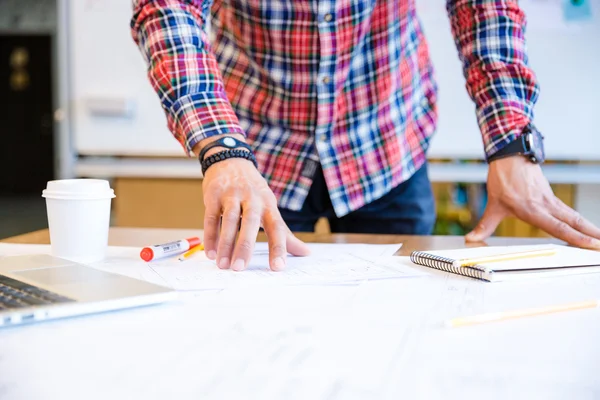 Hands of young man standing and working in conference room — Stock Photo, Image