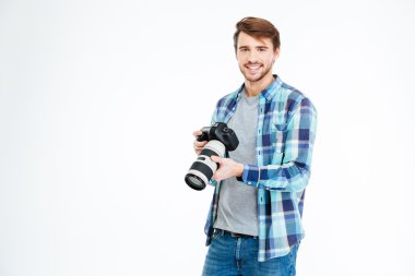 Male photographer holding photo camera 
