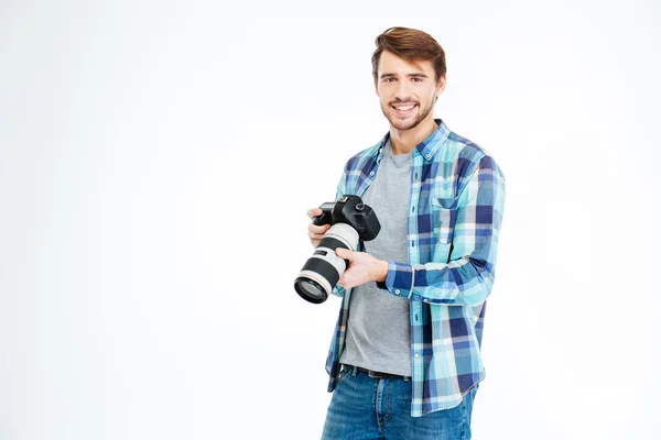 Male photographer holding photo camera — Stockfoto