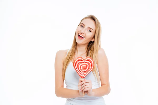 Glad kvinna med hjärtat formade lollipop — Stockfoto