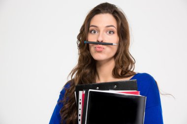 Amusing comical woman making funny face with pen 