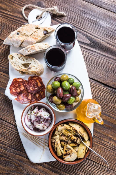 Authentic tapas served on marble board — Stock Photo, Image