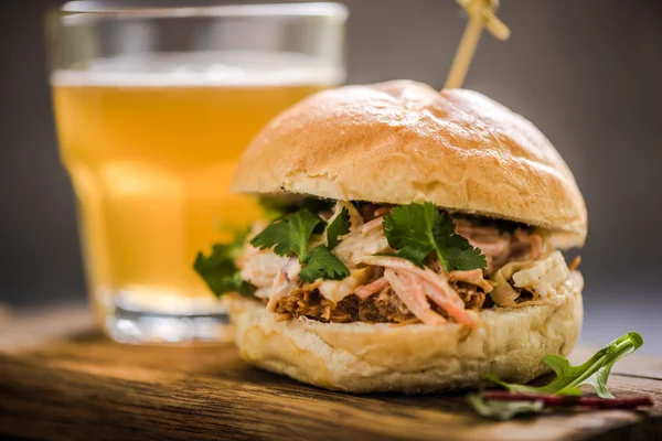 serving pub food, pork bap with cider