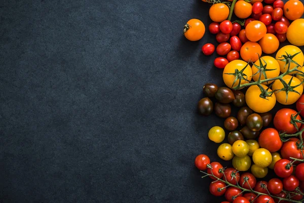 Färska tomater bakgrund — Stockfoto