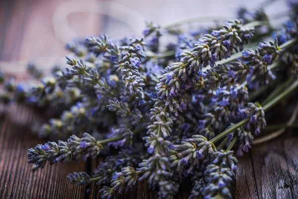 Lavender bloom on wooden table — Stock Photo, Image