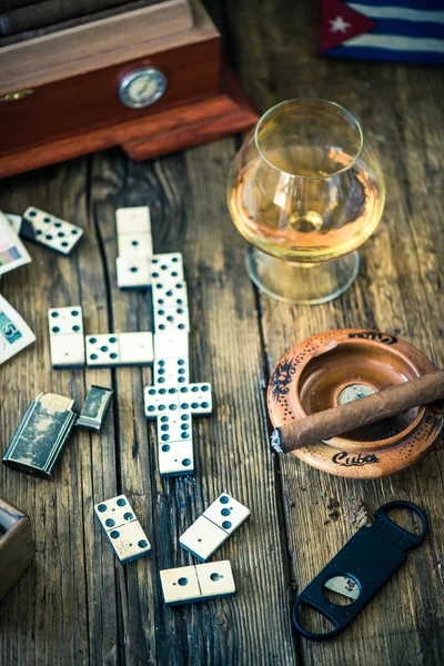 Traditional cuban domino game, cigars and rum — Stock Photo, Image