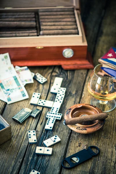 Playing cuban domino for money and smoking cigars — Stock Photo, Image