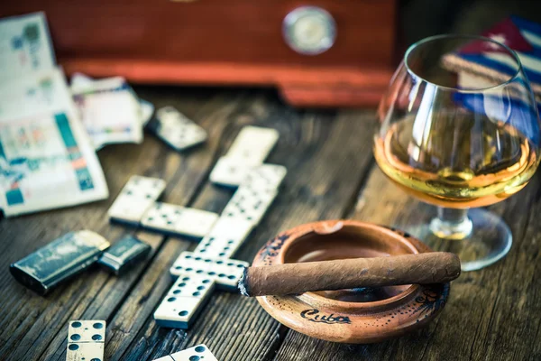 Traditional cuban game and cigars — Stock Photo, Image