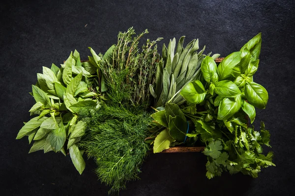 Fresh herbs in wooden rustic box — Stock Photo, Image