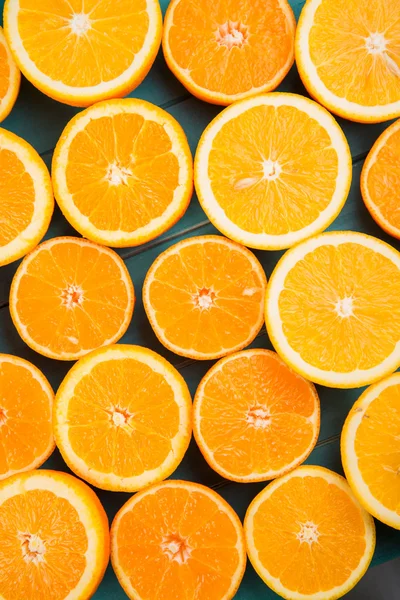 Orange halves on table — Stock Photo, Image