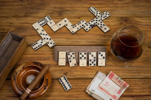 Top table view on cuban cigar and domino — Stock Photo, Image