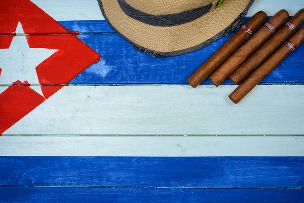 Cigars and straw hat — Stock Photo, Image