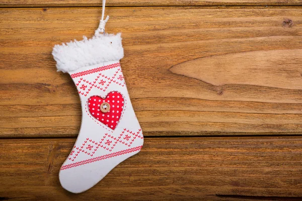 Santa sock hang on white wood background — Stock Photo, Image