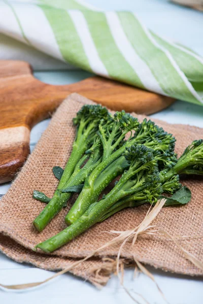 Fresh green broccolini on table — Stock Photo, Image