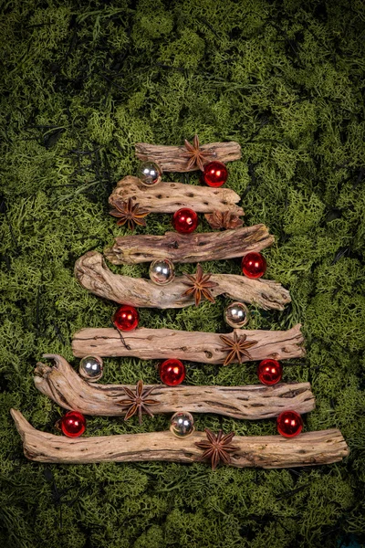 Christmas tree shape made from drift wood — Stock Photo, Image