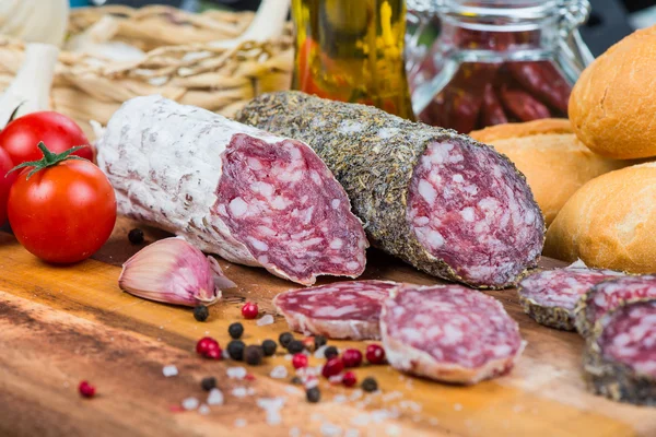 Salami with spices — Stock Photo, Image