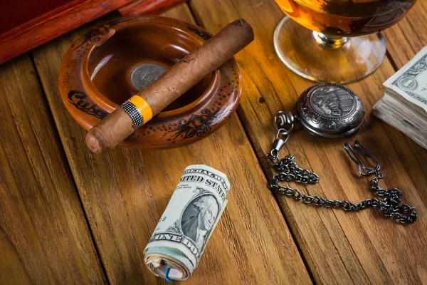 Relaxing cuban cigar after hard day, with glass of Rum — Stock Photo, Image