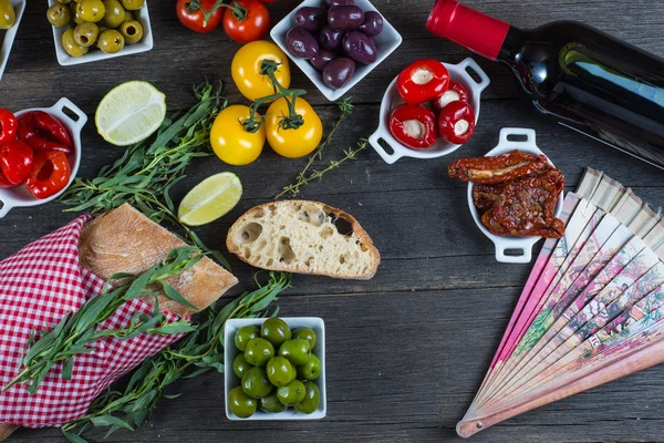 Authentic spanish tapas selection on wooden table from above — Stock Photo, Image