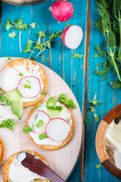 Healthy snacks,crackers with cottage cheese and fresh vegetables