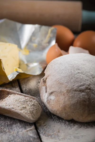 Baking on rustic table, dough and ingredients — Stock Photo, Image