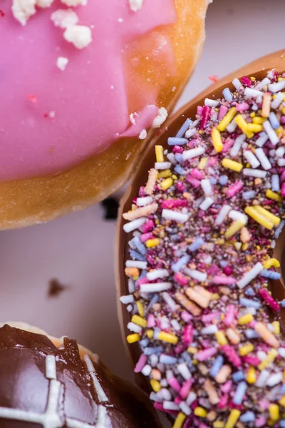 Close view on hand decorated artisan donut — Stock Photo, Image