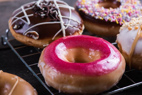 Close view on hand decorated artisan donut — Stock Photo, Image