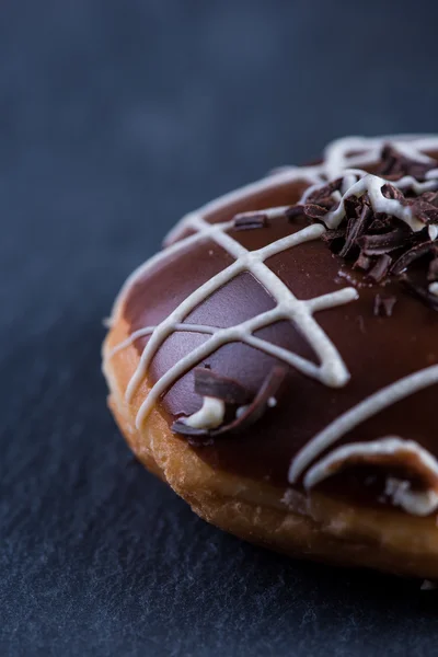 Close view on hand decorated artisan donut — Stock Photo, Image