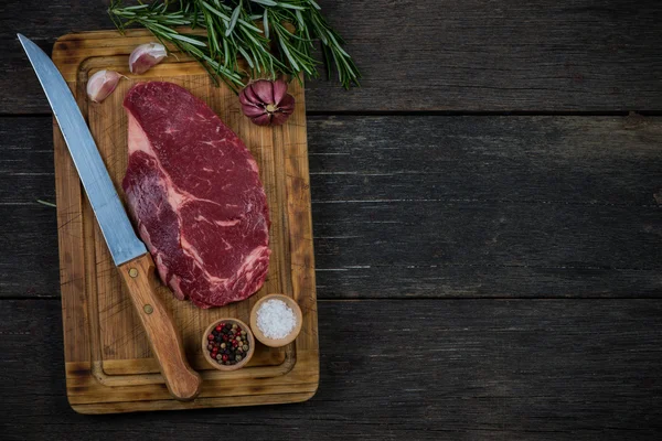 Raw Ribeye Beef Steak Herbs Spices Wooden Rustic Table — Stock Photo, Image