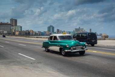 Classic american car drive on street in Havana,Cuba