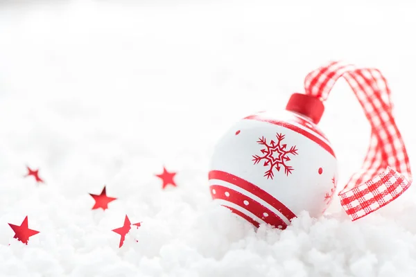 Vintage Christmas ball on snow background — Stock Photo, Image