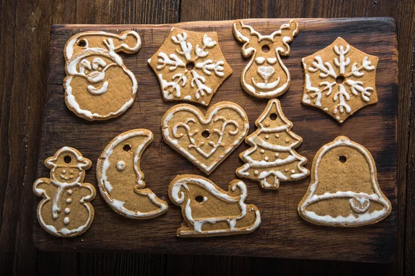 Christmas homemade cookies on wooden board — Stock Photo, Image