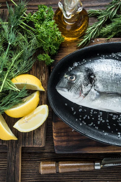 Fresh sea fish in frying pan — Stock Photo, Image