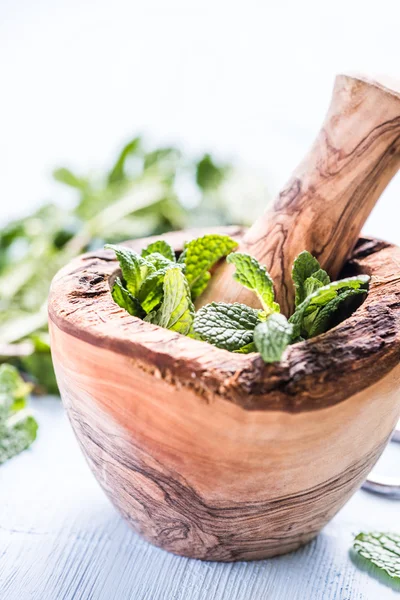 Fresh mint on wooden table — Stock Photo, Image